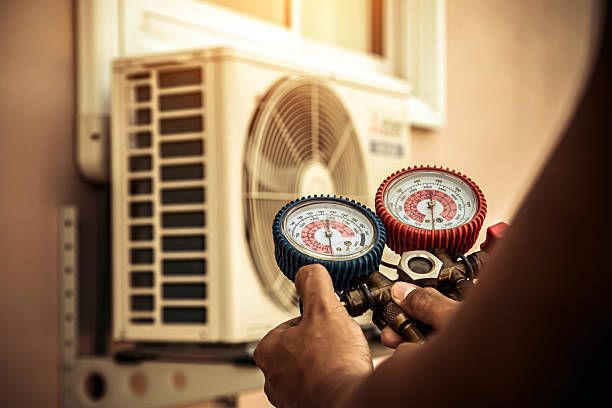 Professional Heat Pump Repair technician working in Sonora, TX